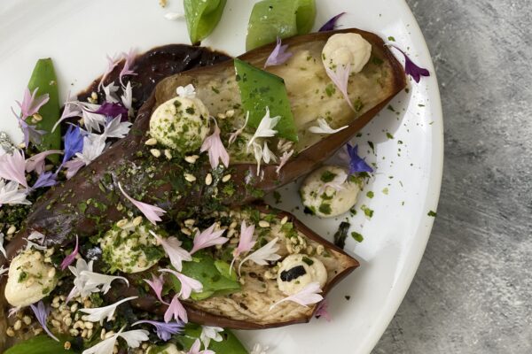 Delightful Japanese Eggplant with Black Garlic Miso and topped with Furikake.