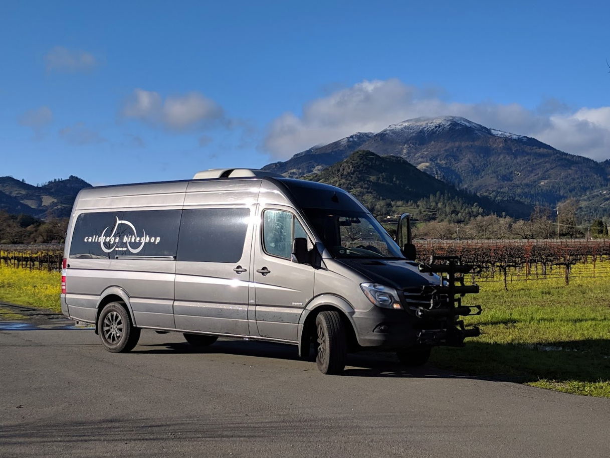 Calistoga Bikeshop’s travel van for guided bike tours in Napa, as featured in Davis Estates’ wine blog on the best things to do in Calistoga