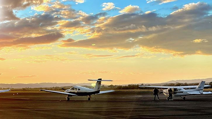 propeller planes on the airfield at Napa County Airport, as shown in the Davis Estate wine blog post featuring a Napa valley airports guide and flights to Napa