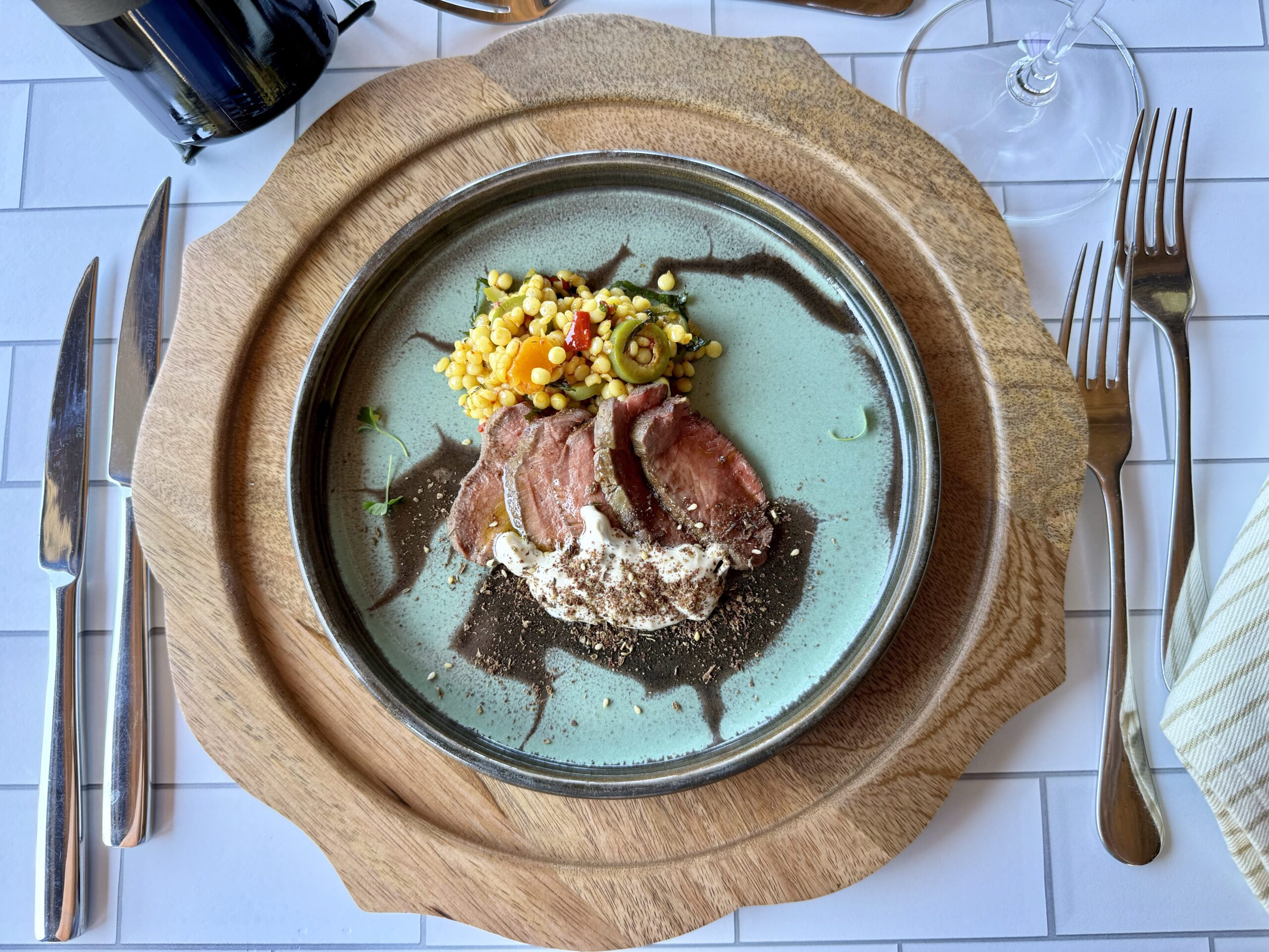 plated lamb and couscous