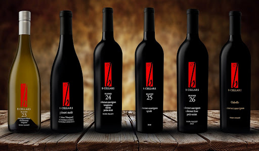 B Cellars Napa Valley wine bottles on wooden table