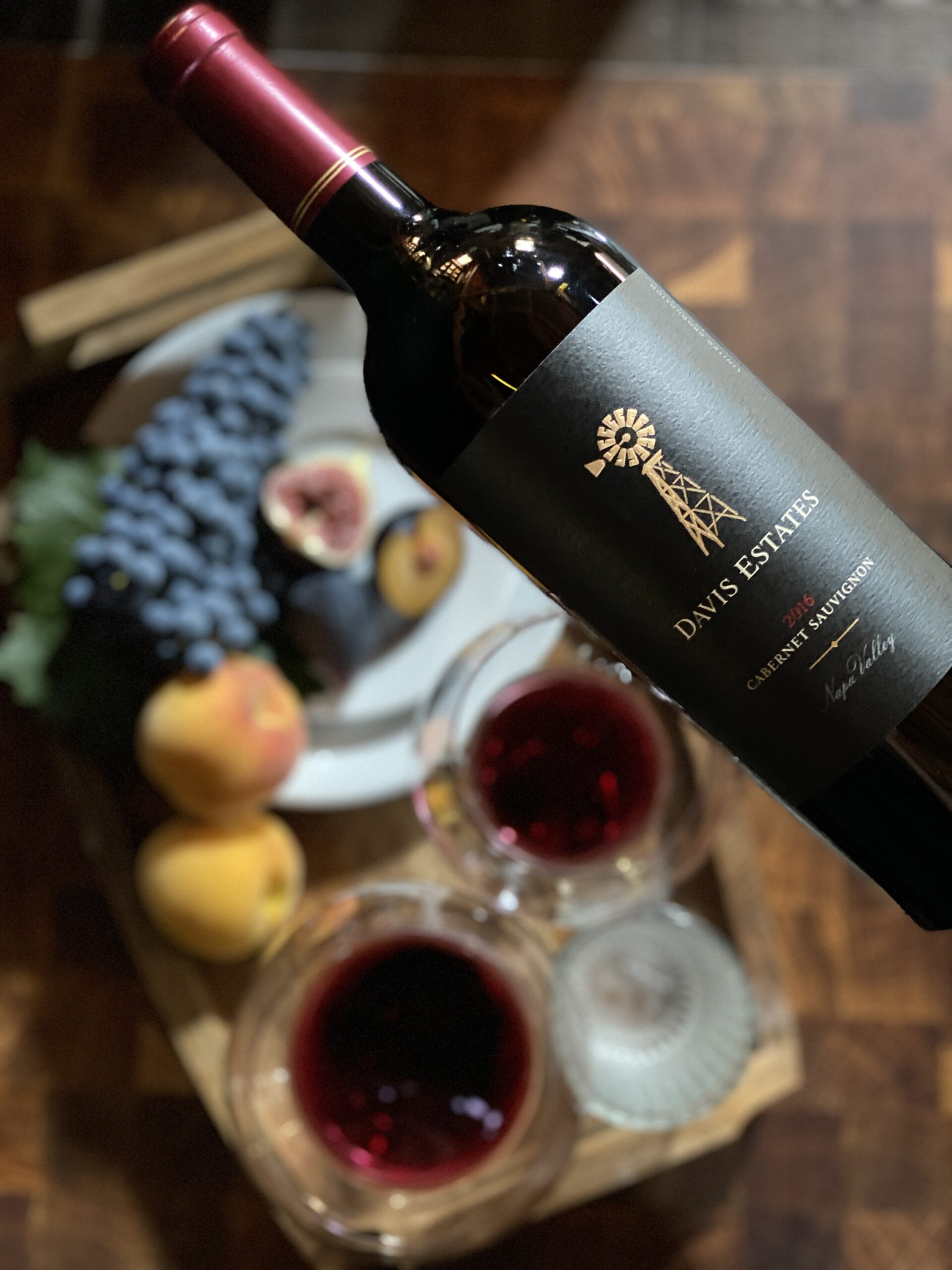 bottle of wine over glasses