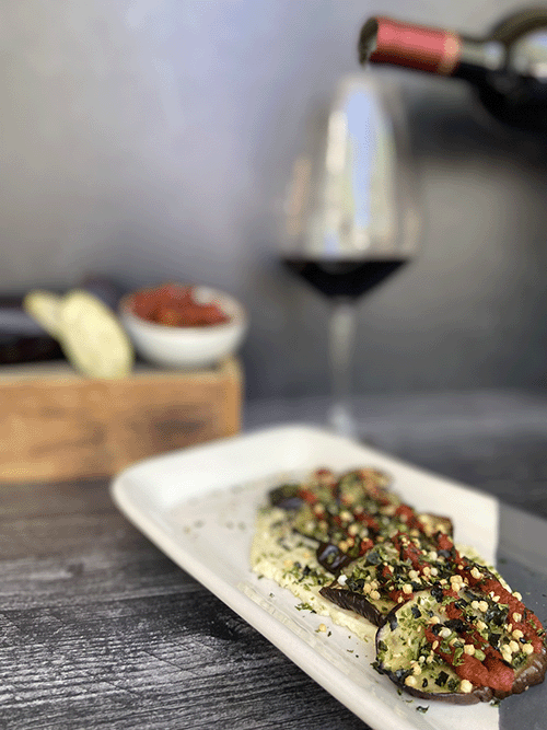 eggplant with a wine glass