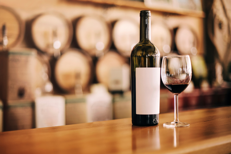 Wine bottle and glass at Davis Estates cellar