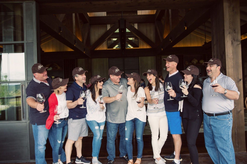 Group enjoying wine at Davis Estates winery