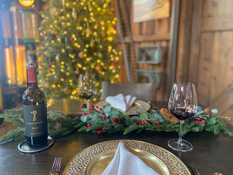 Davis Estates wine set on festive table with holiday décor