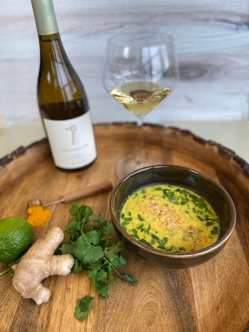 Davis Estates white wine paired with soup and fresh herbs