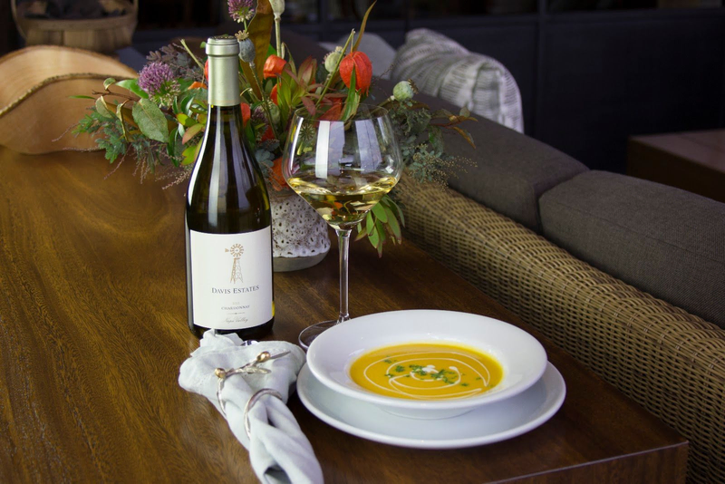 Davis Estates Chardonnay with soup pairing on table