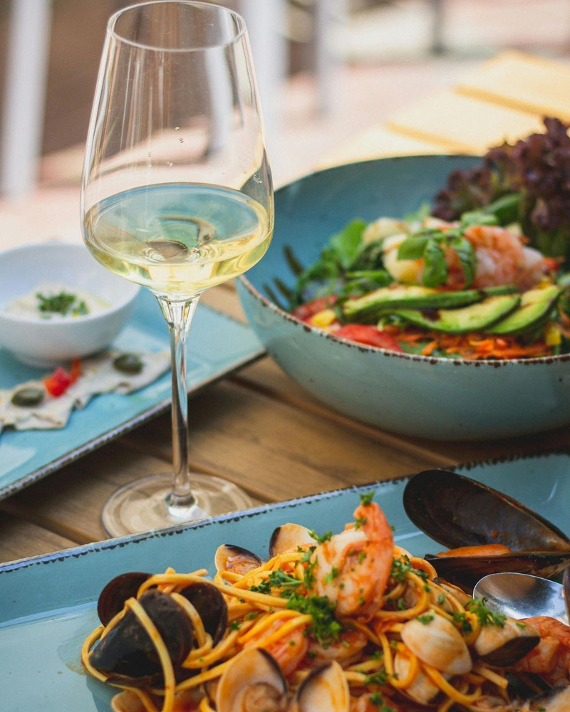 White wine and seafood pasta at Davis Estates