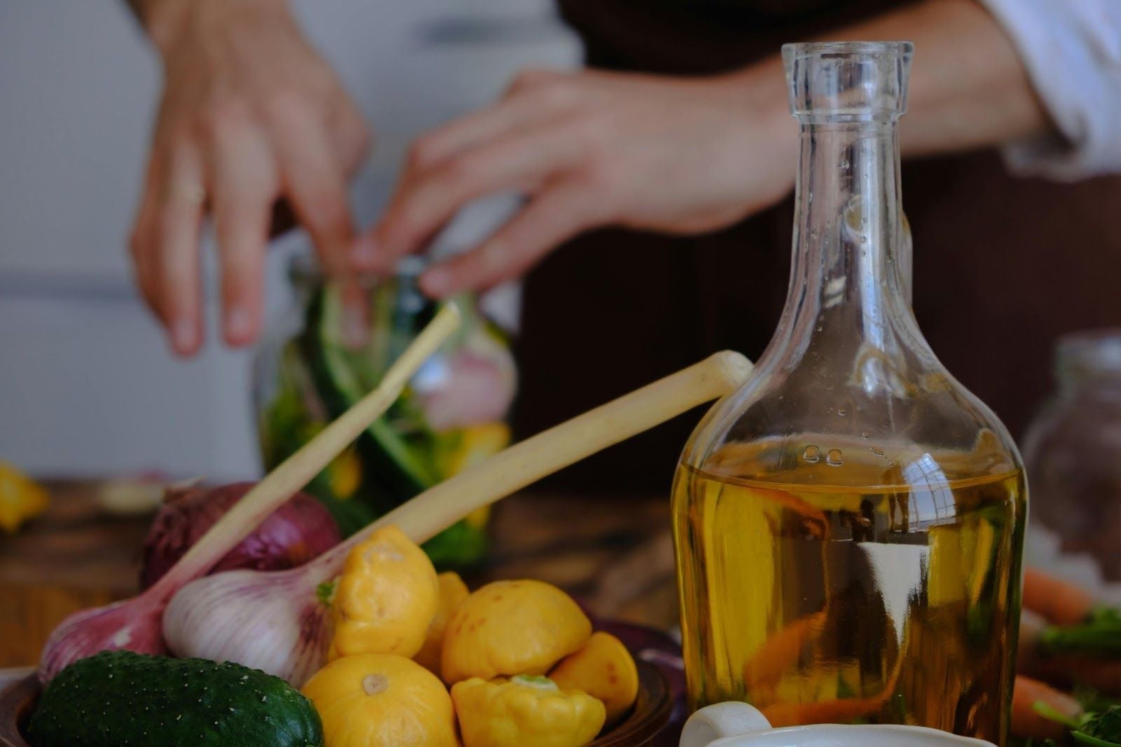 Olive oil and fresh ingredients for cooking